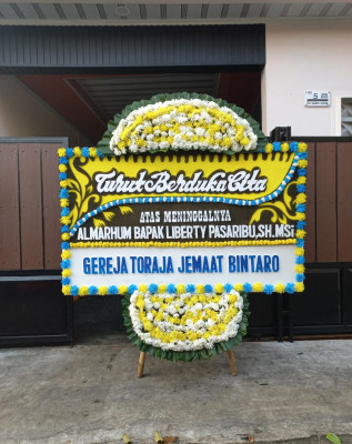 Papan Bunga Duka di Makimi